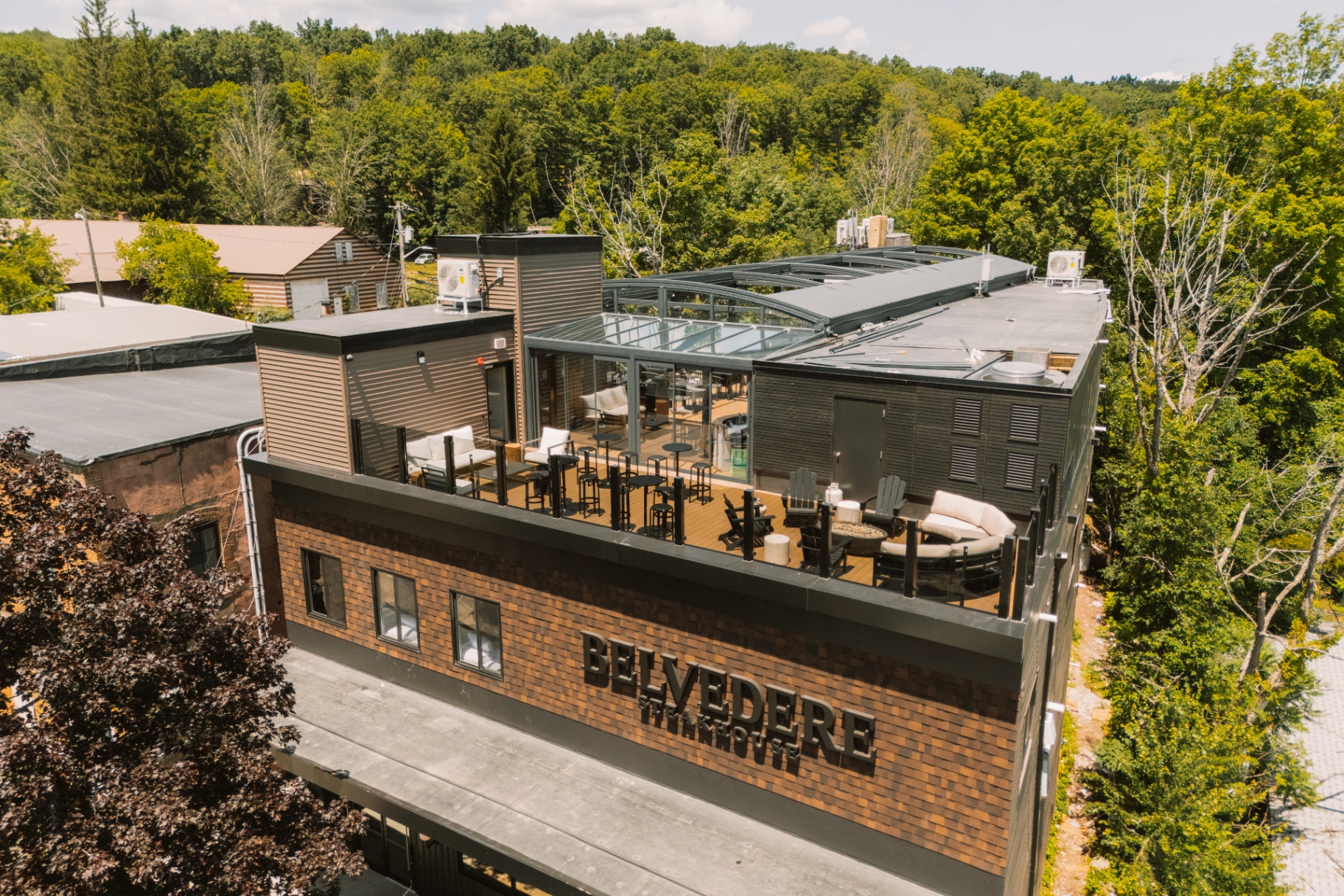 Aerial view of the lodge showing the rooftop terrace and street frontage