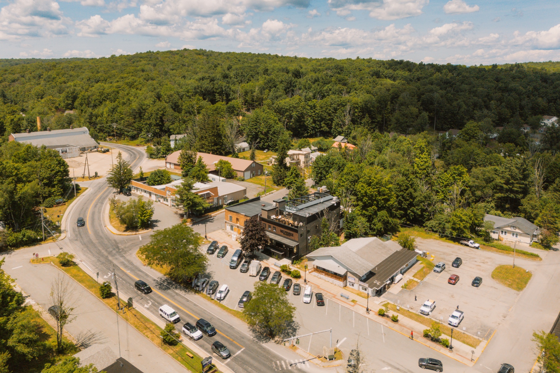 Aerial view of The Belvedere Suites and the surrounding Woodridge landscape